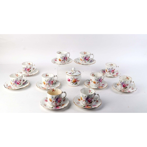 307 - A set of ten Royal Crown Derby Derby Posies pattern tea cups and saucers; together with a matching p... 