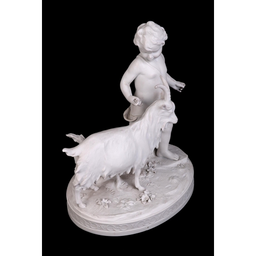 310 - A Parian figural depicting a young boy with a goat, 20cms wide.