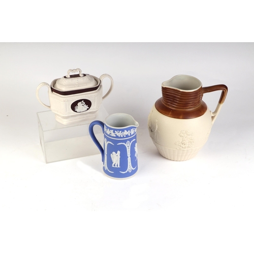 314 - An earthenware salt glazed harvest jug, impressed 'Turner', 26cms high; together with a blue Jasperw... 