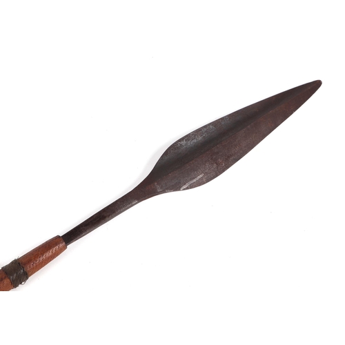 320 - A South African Assegai / Zulu spear with broad leaf shaped stabbing blade, hardwood shaft with knob... 