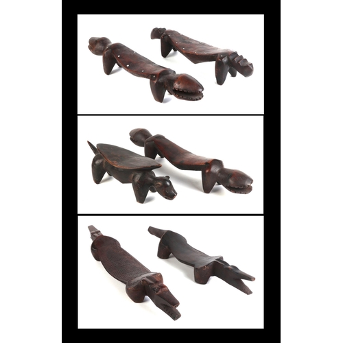 321 - Six African Ivory Coast Senufo zoomorphic carved hardwood head rests, the largest 52cms long (6).