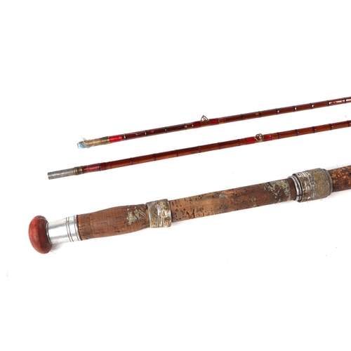 327 - A vintage split cane fishing rod.