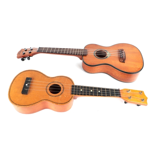 349 - A LAG model U177C concert ukulele with soft carry case; together with a Sweet Tone ukulele (2).