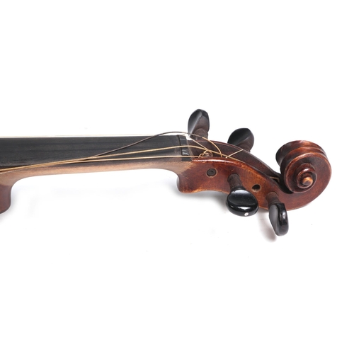 351 - A one-piece back violin & bow, the back 36cms (14ins) long, cased.