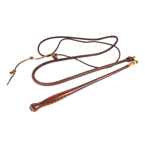 359 - A leather bull whip with treen handle.