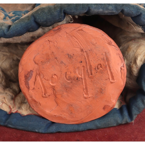 364 - A terracotta figure depicting an old lady, signed to the underside, on an ebonised and velvet stand,... 