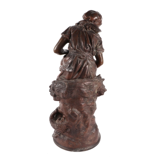 378 - A late 19th century bronzed spelter figure of a young woman pouring a drink, 45cms high.