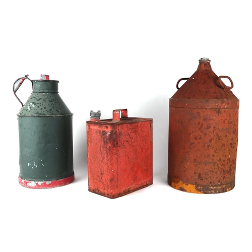 39 - A two-gallon petrol can with brass cap and other similar cans (6).