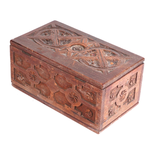 405 - An 18th century style small carved pine box, 25cms wide.