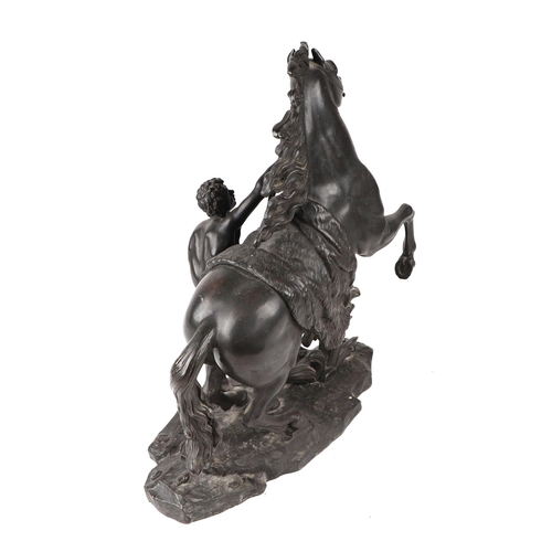 408 - After Guillaume Coustou - a pair of French bronze Marley horse groups, each bear Coustou signature, ... 