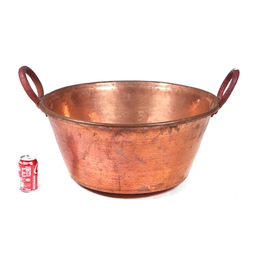 412 - Three very large two-handled copper pans, the largest 68cm diameter (3)