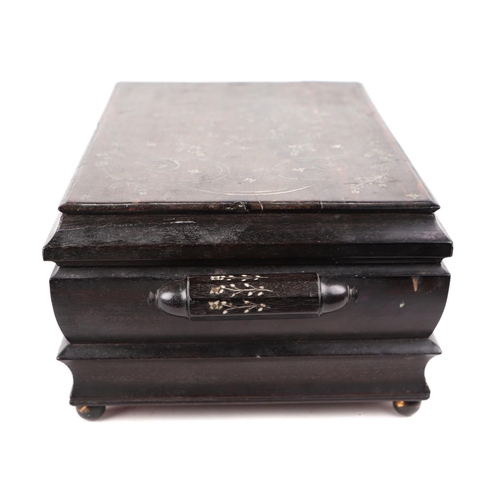 415 - A Victorian Anglo-Indian hardwood table top casket with inlaid ivory decoration, 30cms wide.   Ivory... 