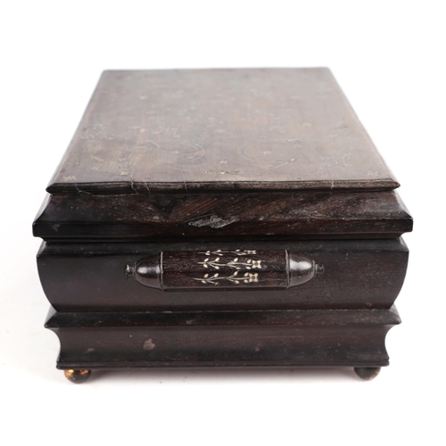 415 - A Victorian Anglo-Indian hardwood table top casket with inlaid ivory decoration, 30cms wide.   Ivory... 