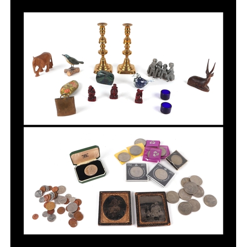 417 - A pair of brass candlesticks with knopped stems; together with assorted coinage; wooden animals and ... 