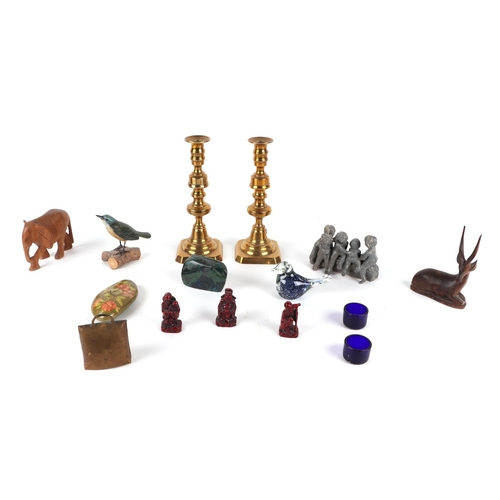 417 - A pair of brass candlesticks with knopped stems; together with assorted coinage; wooden animals and ... 