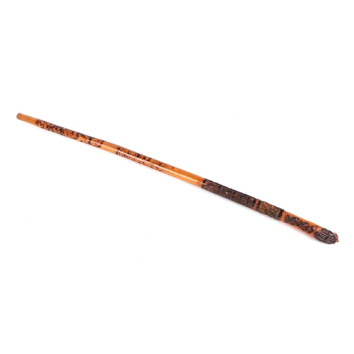 428 - An Indian walking stick with lion head terminal, 95cms long.