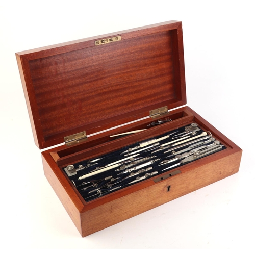 454 - A Stanley of London mahogany case drawing set to include compasses and dividers.  Ivory Submission r... 