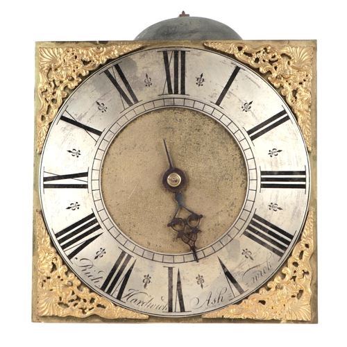 458 - An 18th century brass longcase clock dial and movement, the 26cms square dial with silvered chapter ... 