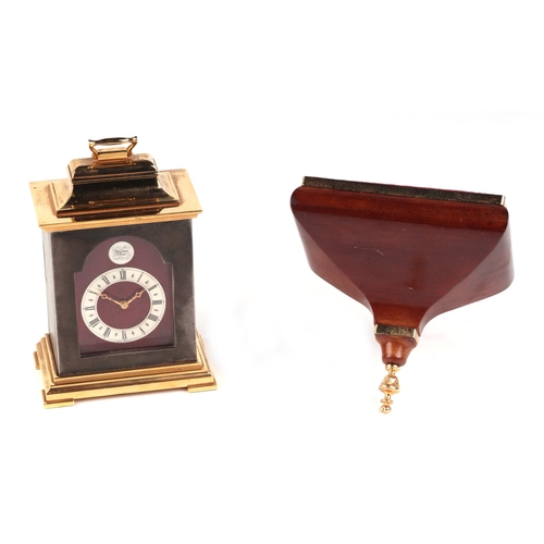 472 - A Thwaites & Reed miniature Grant bracket clock and bracket, 15cms high.