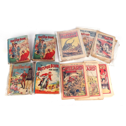 51 - A quantity of assorted pre and post WWII comics and Boys annuals to include The Hotspur Book, The Wi... 