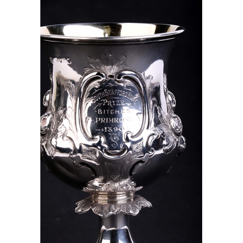 526 - A Victorian silver goblet or chalice decorated flowers, with presentation inscription, London 1874, ... 