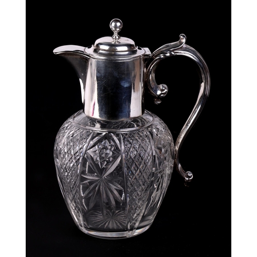 538 - A silver mounted cut glass claret jug, Chester 1910, 20cms high.