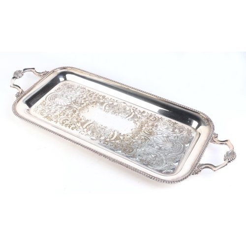 553 - A silver plated two-handled tray; together with an antler handled carving set and other silver plate... 