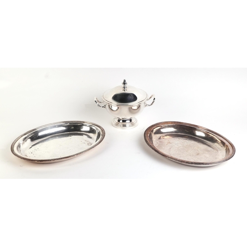 554 - A quantity of assorted silver plated items to include entree dish and cover, the cover with dog mask... 