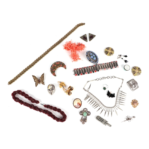 563 - A quantity of costume jewellery to include a stick coral necklace; a Japanese Komai bracelet and oth... 