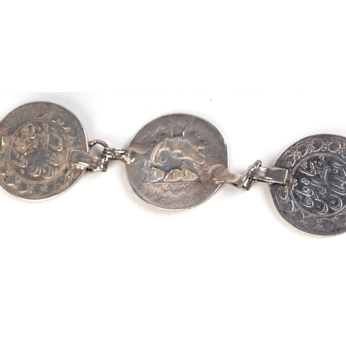 569 - A Persian silver coin belt.