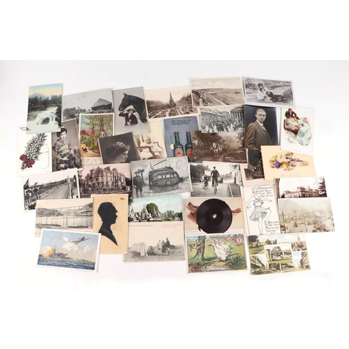 57 - A quantity of assorted postcards to include topographical, social history, humorous, real photograph... 