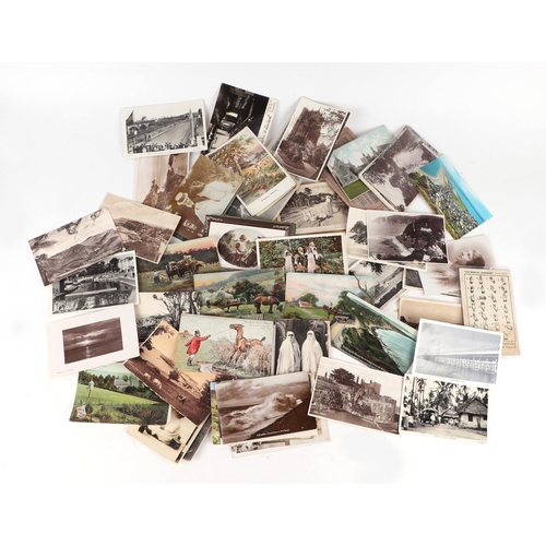 57 - A quantity of assorted postcards to include topographical, social history, humorous, real photograph... 