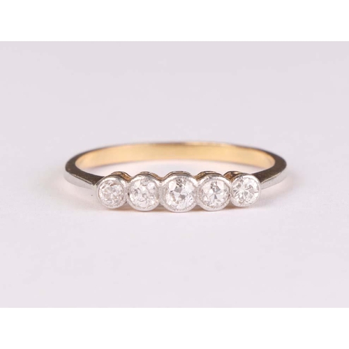 572 - An 18ct gold five-stone diamond ring, approx UK size R, 2.2g.