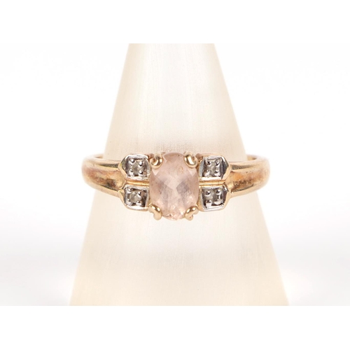 589 - A 9ct gold ring, with central morganite and diamond set shoulders, approx UK size N, 2.7g