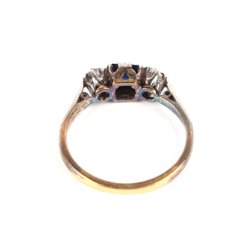 591 - A 18ct gold, sapphire and diamond three stone ring, approx UK size K, 1.9g.