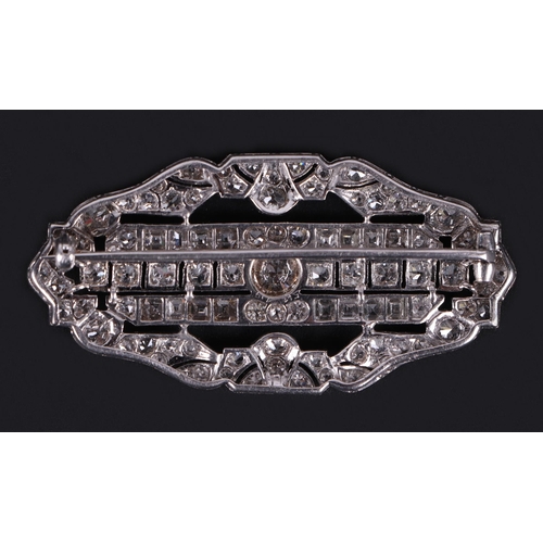 593 - An Art Deco platinum and diamond panel brooch, the central brilliant cut diamond approx 0.47ct, 16 t... 