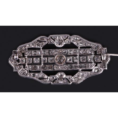 593 - An Art Deco platinum and diamond panel brooch, the central brilliant cut diamond approx 0.47ct, 16 t... 