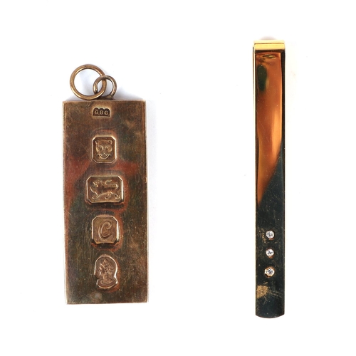 596 - A group of stick pins to include enamel, agate and citrine; together with a silver gilt ingot pendan... 