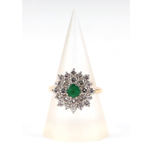 597 - An 18ct gold emerald and diamond cluster ring, approx UK size M, 5.1g; together with a 1988 Jeweller... 