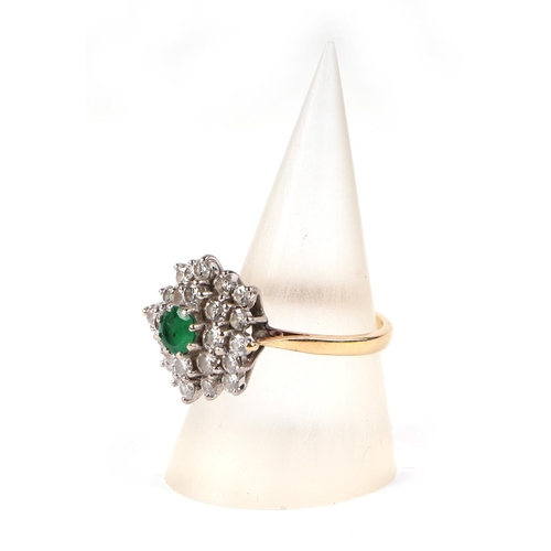 597 - An 18ct gold emerald and diamond cluster ring, approx UK size M, 5.1g; together with a 1988 Jeweller... 