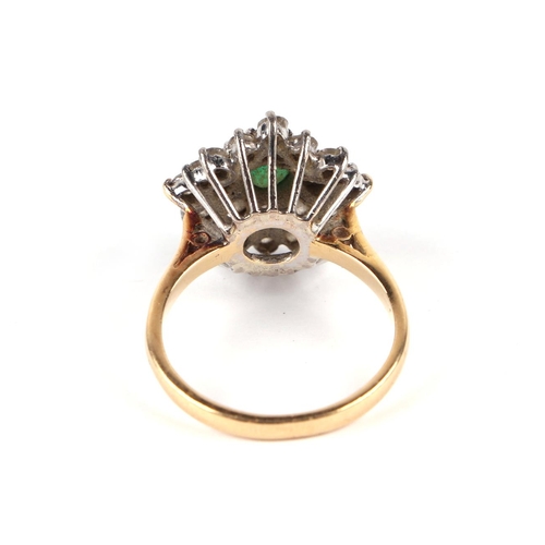 597 - An 18ct gold emerald and diamond cluster ring, approx UK size M, 5.1g; together with a 1988 Jeweller... 