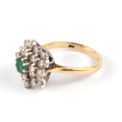 597 - An 18ct gold emerald and diamond cluster ring, approx UK size M, 5.1g; together with a 1988 Jeweller... 