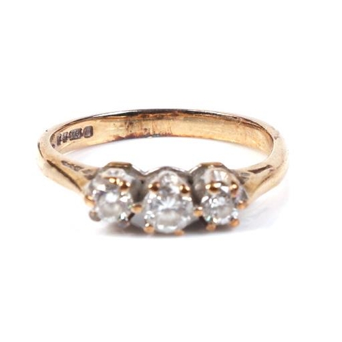 601 - A 9ct gold three-stone diamond ring, approx UK size 'J', 2g.