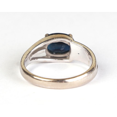 609 - A 14ct white gold sapphire ring, approx UK size N, 4.2g.