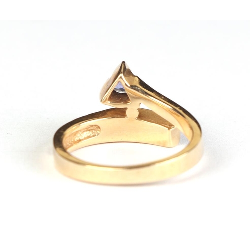 611 - A 14ct gold modern design gem set ring, approx UK size N, 5.1g.