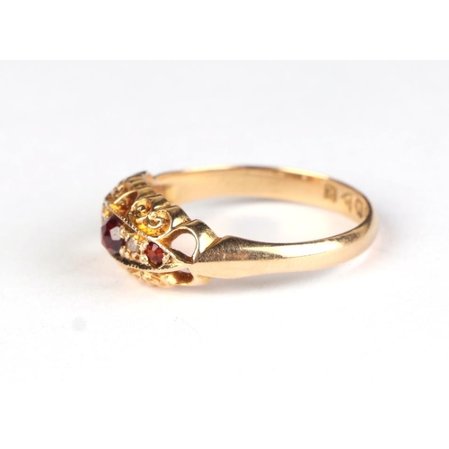 617 - An 18ct gold ruby and diamond gypsy style ring, approx UK size N, 2.8g.