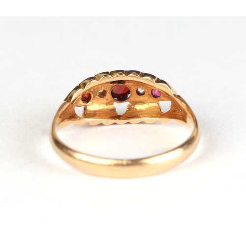 617 - An 18ct gold ruby and diamond gypsy style ring, approx UK size N, 2.8g.