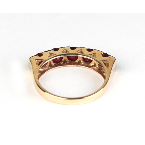 620 - A 9ct gold five-stone garnet ring, approx UK size N, 3g.