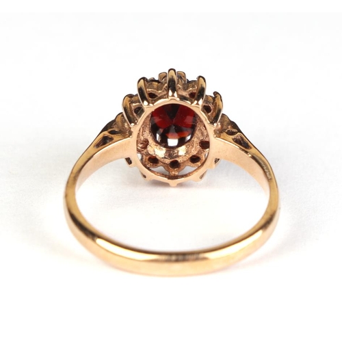 626 - A 9ct gold garnet cluster ring, approx UK size M, 2.7g.