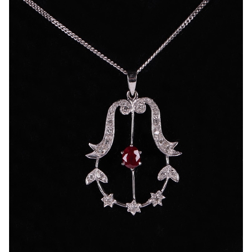 630 - An 18ct white gold diamond and ruby pendant on a fine 18ct white gold chain, 5g.Condition ReportRuby... 